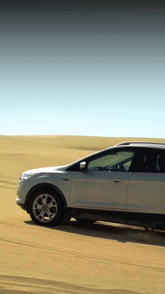 ford-suv-driving-desert-offroad