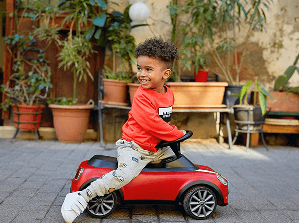 mini-egypt-young-boy-playing-small-mini-car-photo